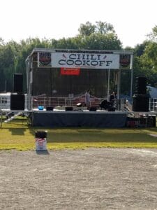 A stage with speakers and lights on it